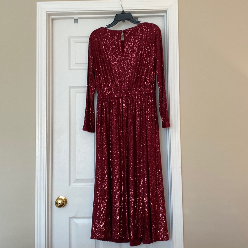 Brand new formal dress. Worn once. No snags or damage.